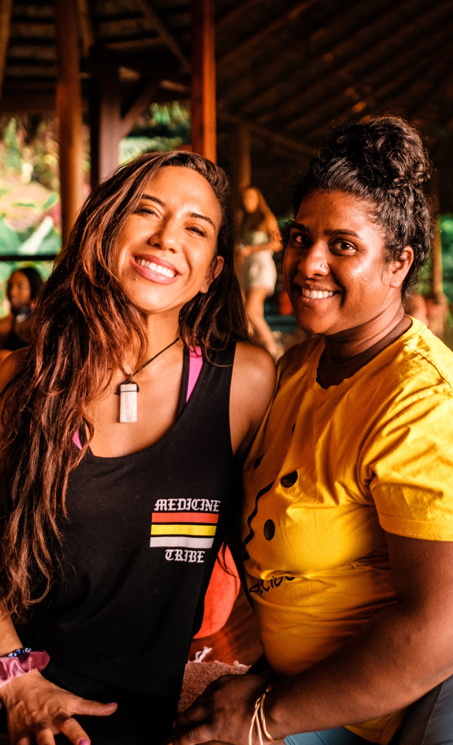 Two friends laughing together at the retreat