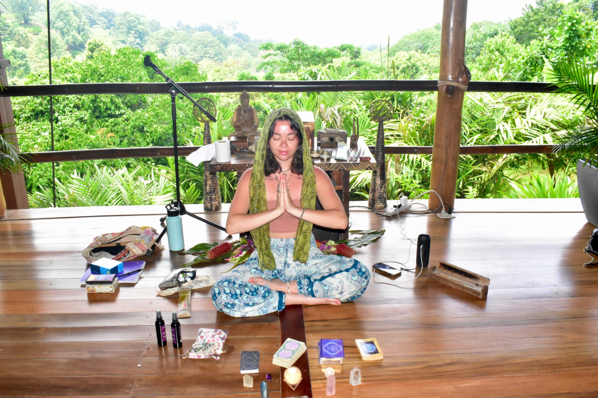 Meditating at the crystal altar in the open-air shala