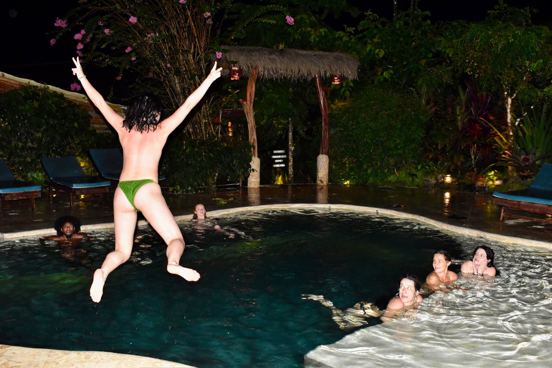 Jumping into the pool at night