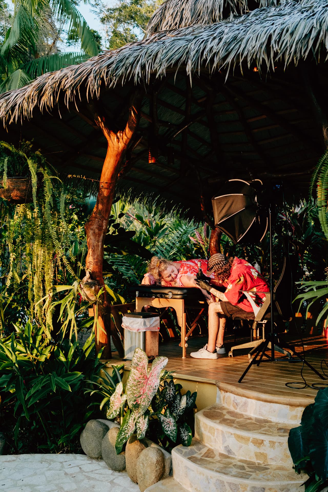A healing session under the thatched palapa surrounded by jungle