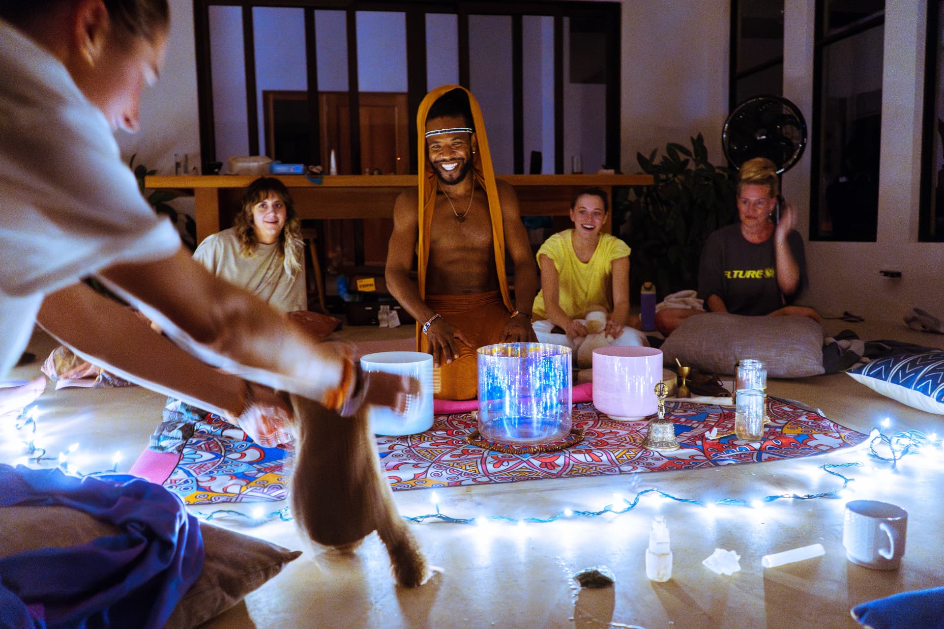 The Troy Story 3 leading a sound journey circle with guests