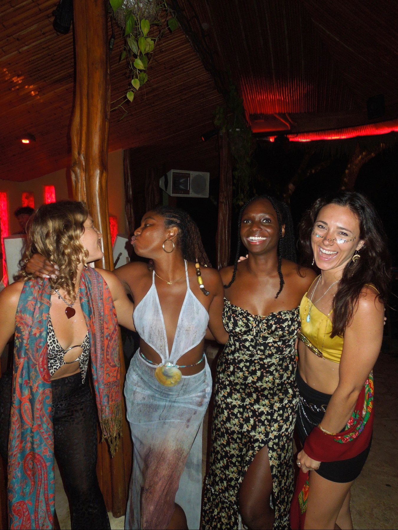 Friends together on the dancefloor at night
