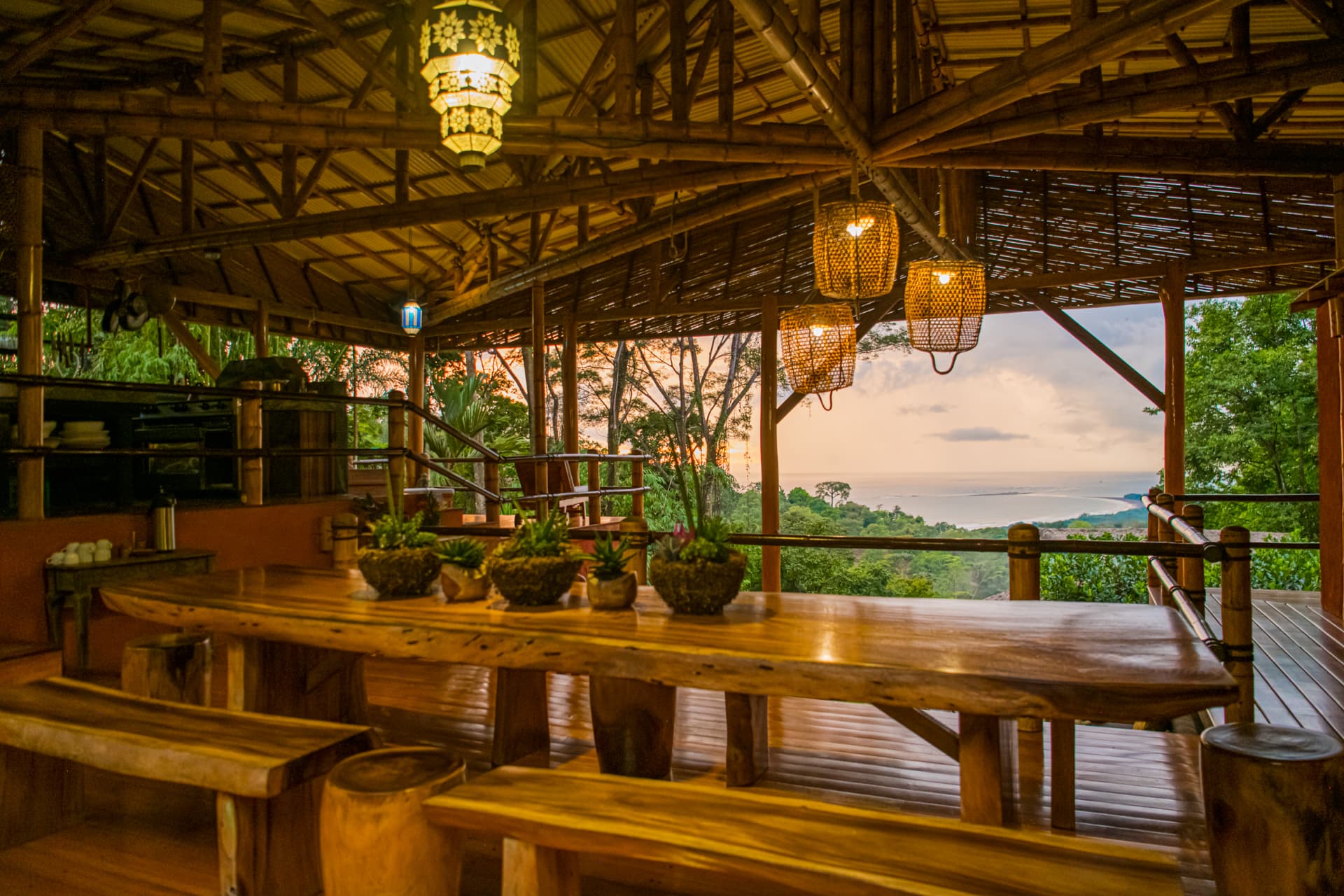 Dining together at sunset over the Whale's Tail coastline