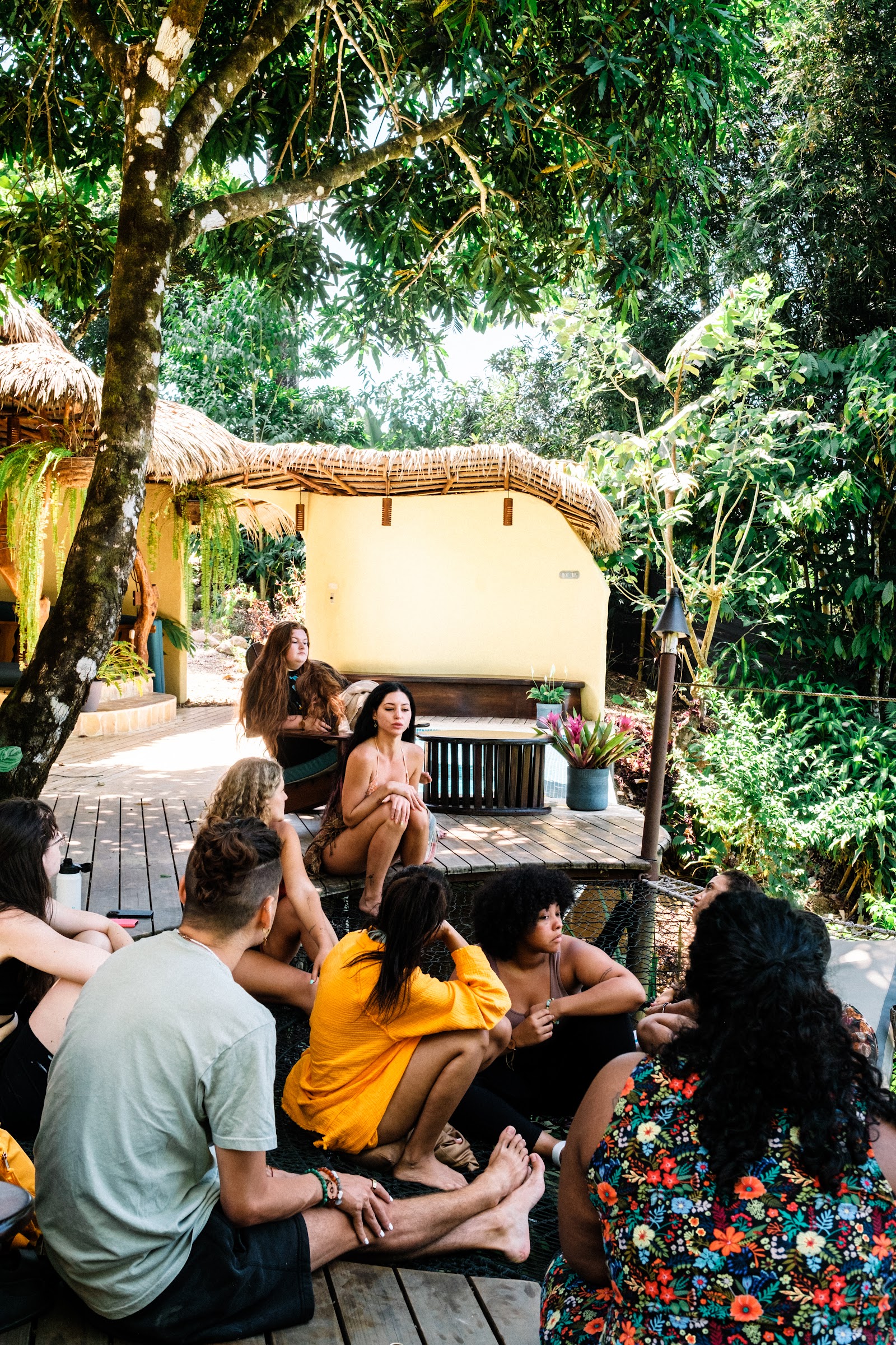 Group hanging out by the truck deep in the jungle
