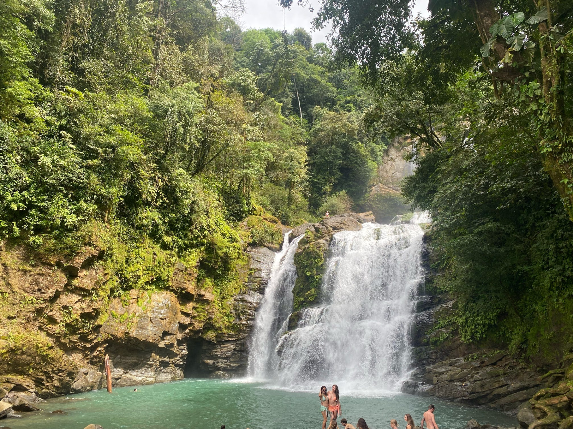 The turquoise plunge pool beneath the Nauyaca waterfalls in the Costa Rican jungle