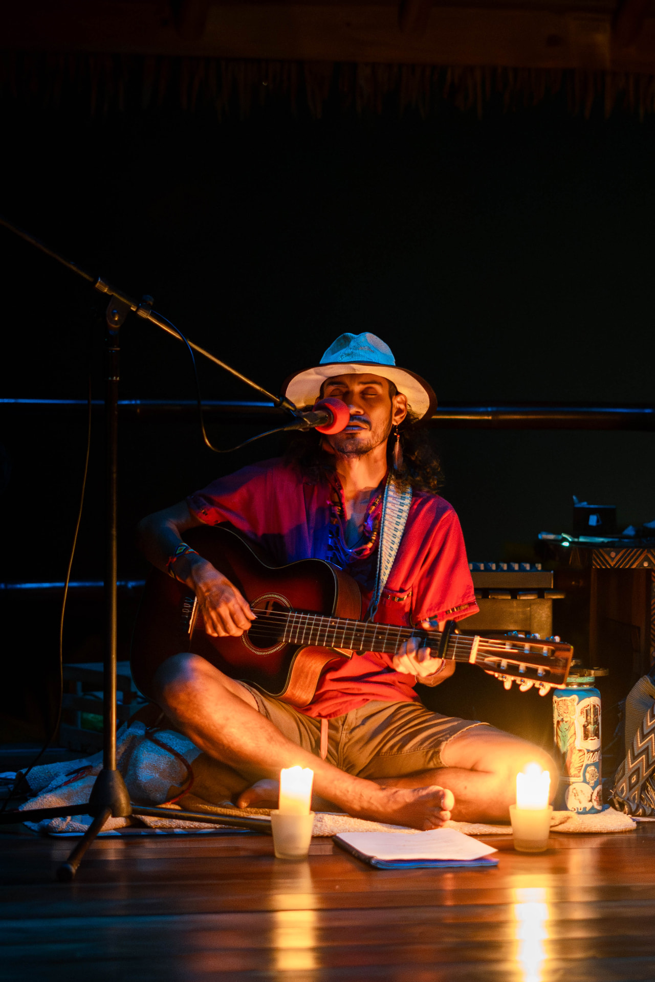 Live singing and guitar by candlelight in the shala