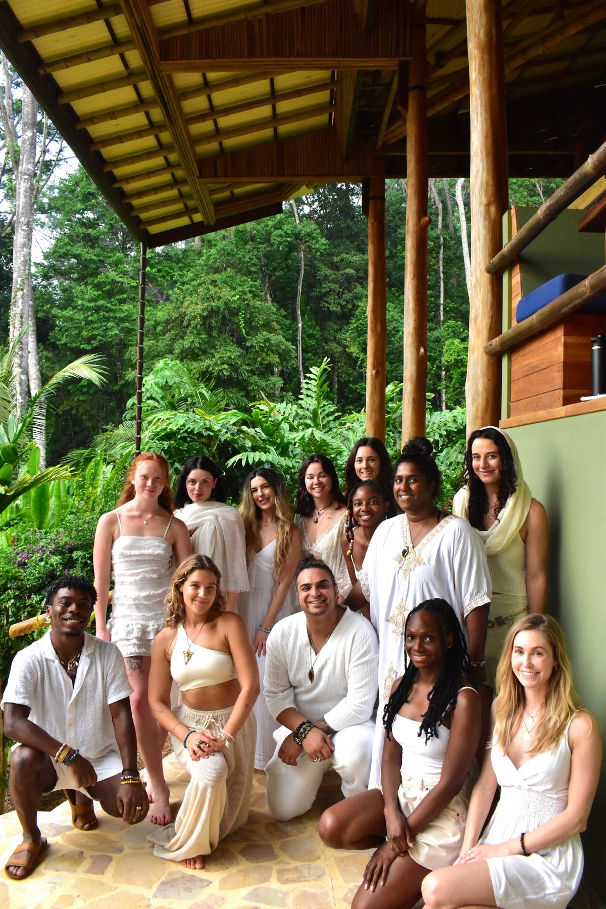 The group dressed in white for the closing ceremony