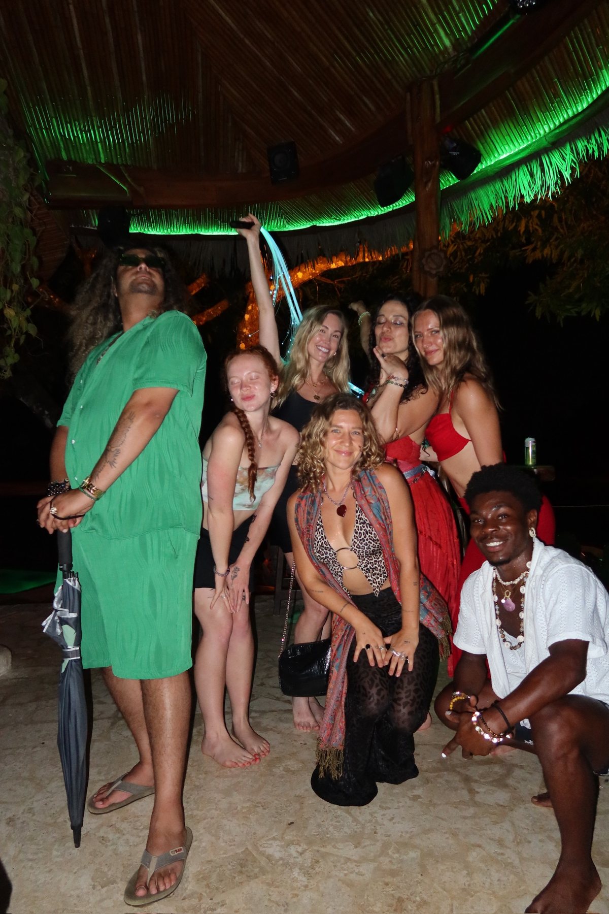 The whole group dancing together at the party