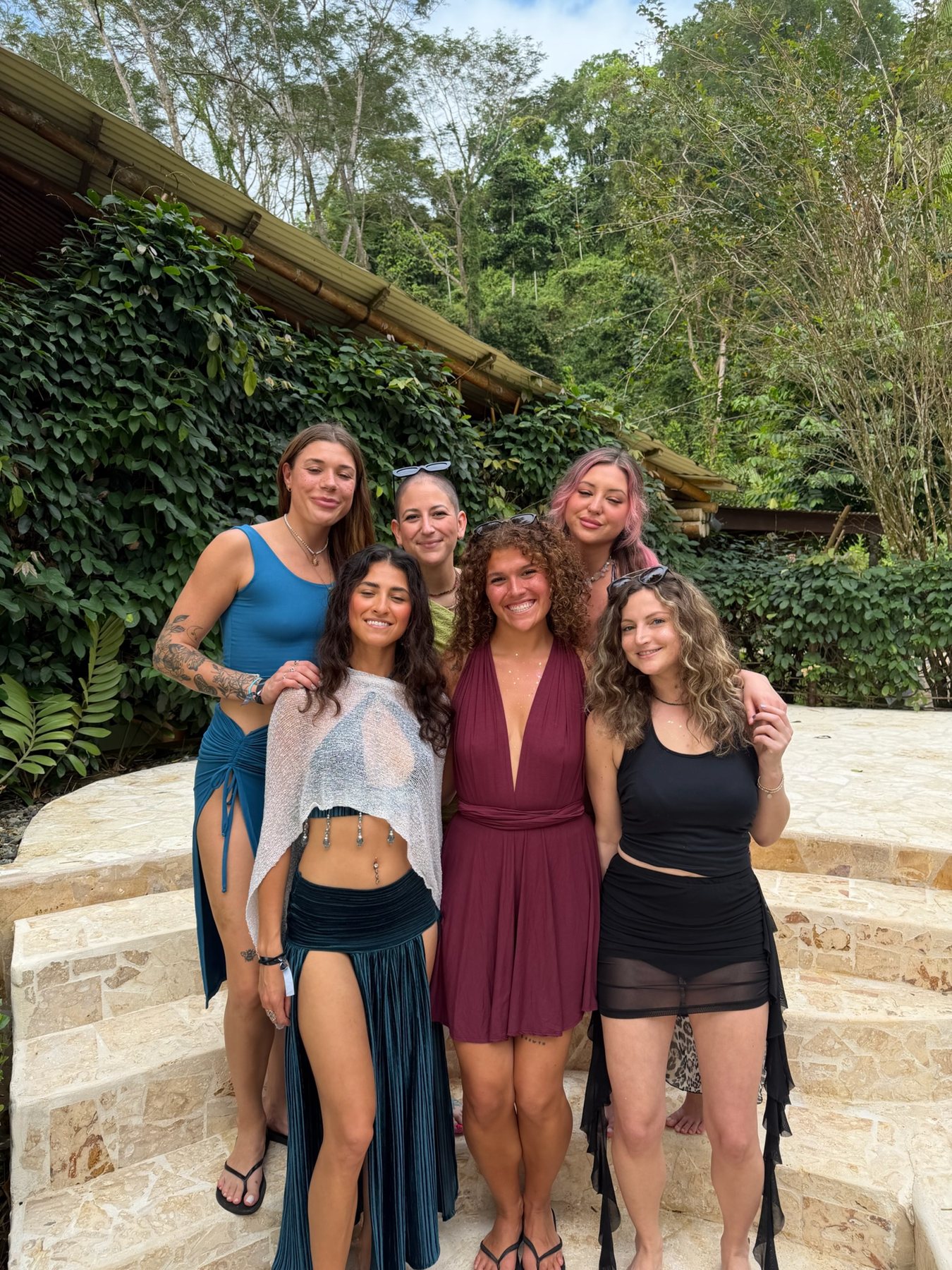 Group portrait on the stone steps at Selva Armonia