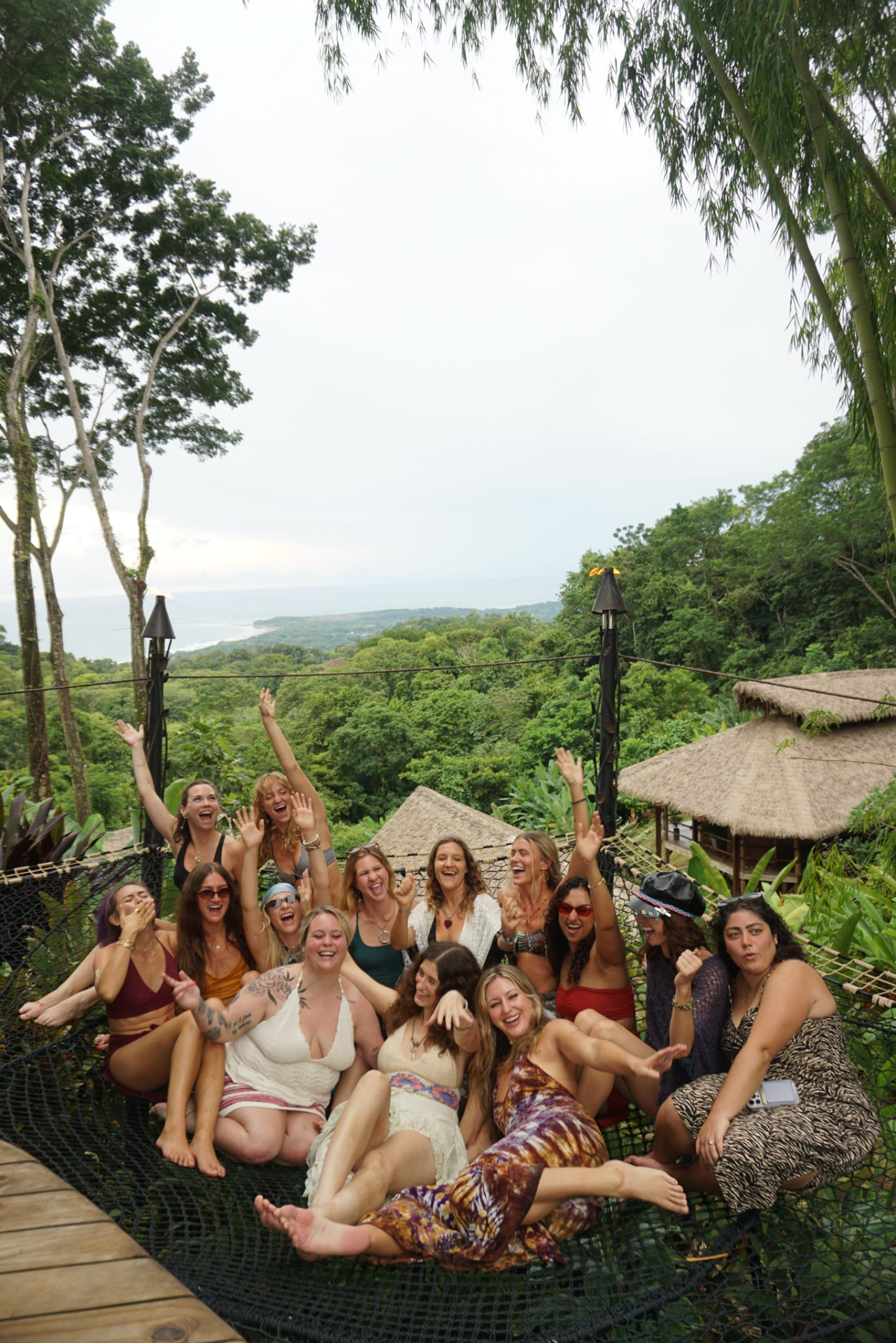 The retreat group cheering together above the jungle